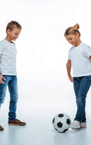 stock-photo-smiling-children-playing-with-soccer